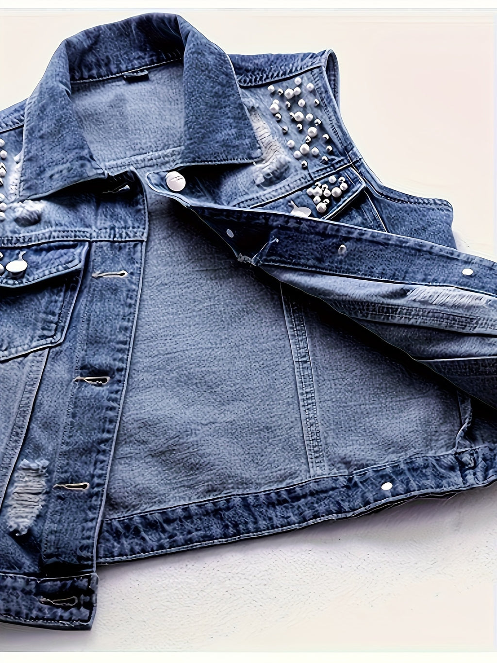 Women's Sleeveless Denim Vest with Pearl Details - Distressed Ripped Jean Jacket, Flap Pockets, Raw Hem, Button-Up Front, Light Blue Denim, Elegant Summer Style